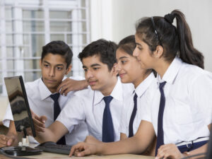 Students learning computer programming - Stock image
